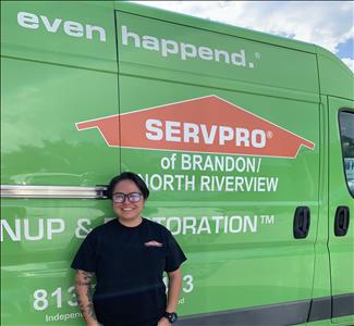 SERVPRO employee next to service truck